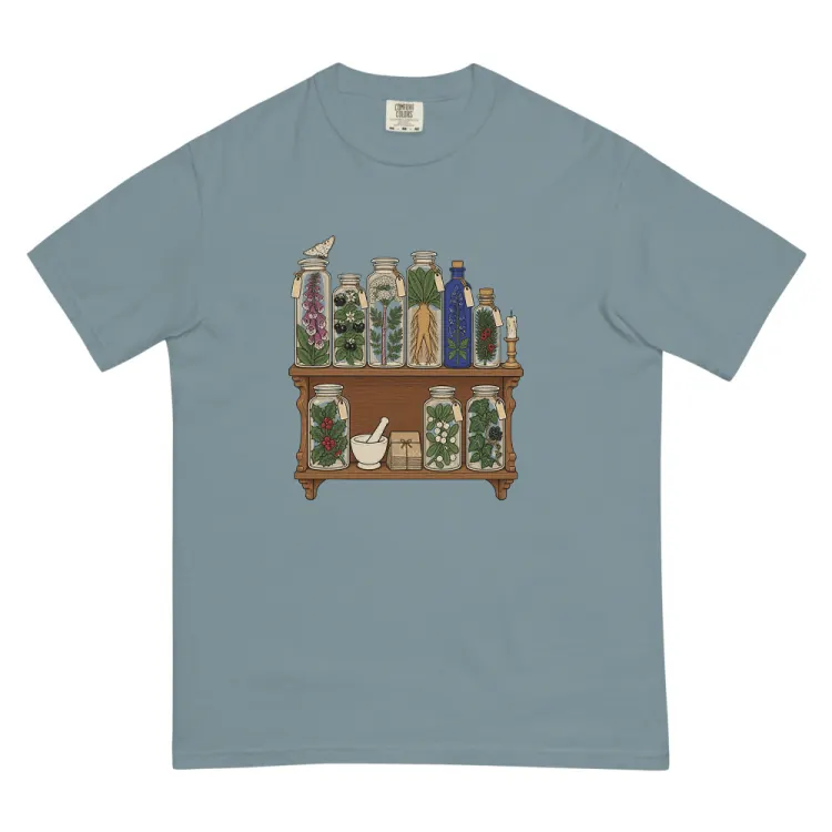 The Witchy Apothecary Shelf Tee in Ice Blue.
