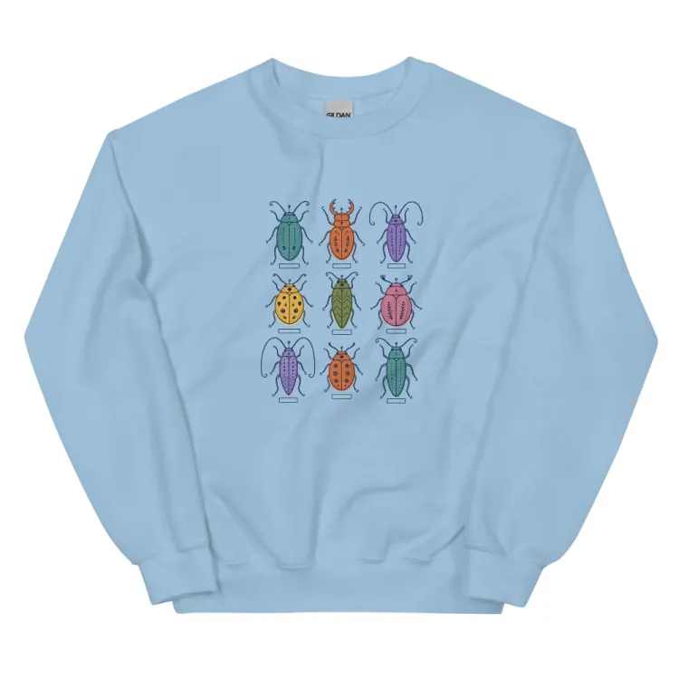 The Nine Beetles Crewneck in Light Blue.