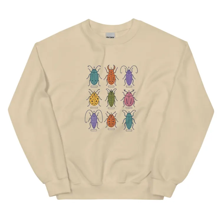 The Nine Beetles Crewneck in Sand.