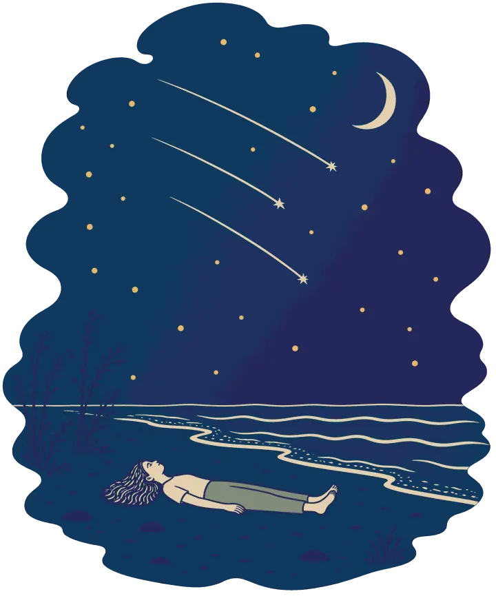 Print artwork: a small figure lying flat on their back on a dark beach at the edge of the tide, looking straight up, while three long shooting stars cross a deep blue night sky with a crescent moon. The waves are a few pale lines.