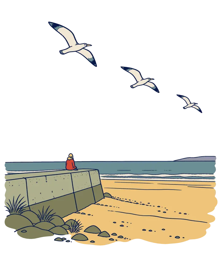 Print artwork: a tiny figure in a red coat sitting alone on a low concrete sea wall above a long flat empty beach, with the grey-blue sea behind and three gulls flying across a wide empty sky.