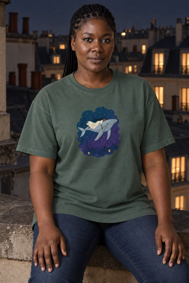 AI-generated image of a fictional model wearing the Whale Over the Rooftops Tee in Blue Spruce, size XL, at 5′9″ tall.