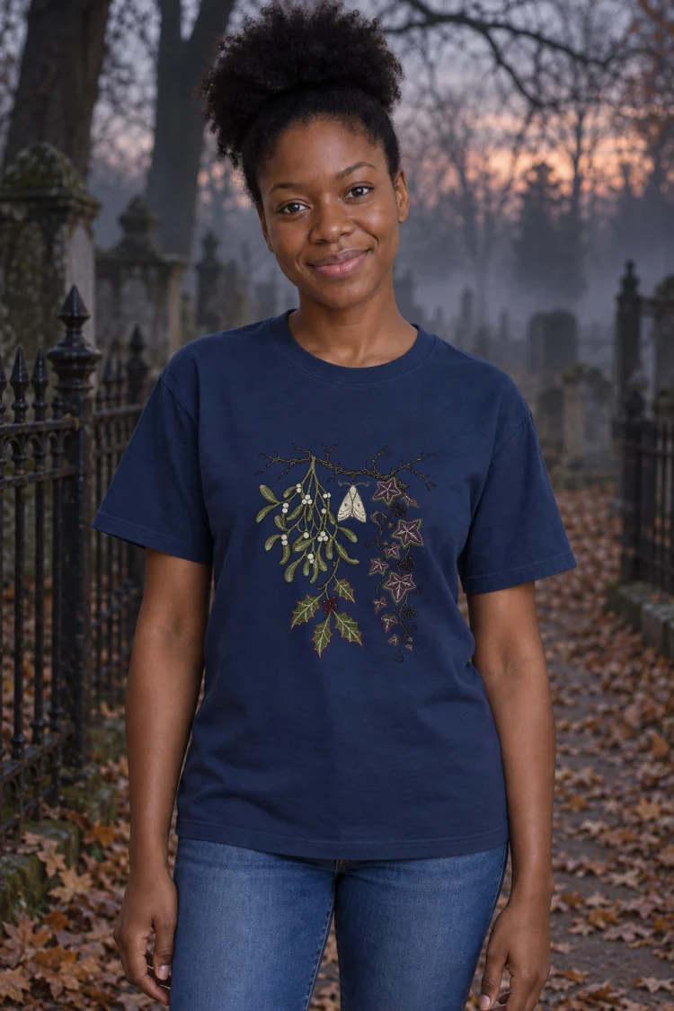 AI-generated image of a fictional model wearing the Holly, Mistletoe & Ivy Tee in True Navy, size S, at 5′3″ tall.