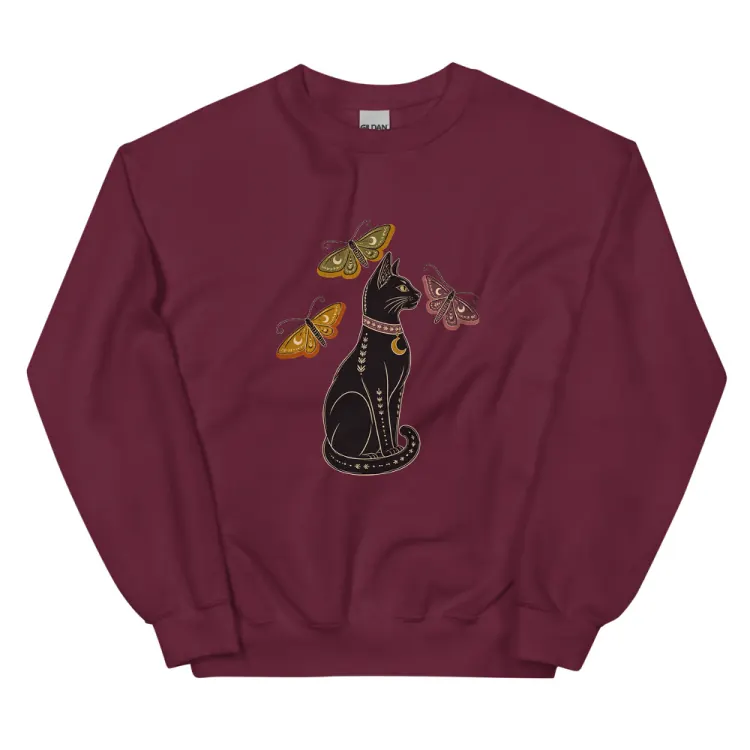 The The Familiar Crewneck in Maroon.