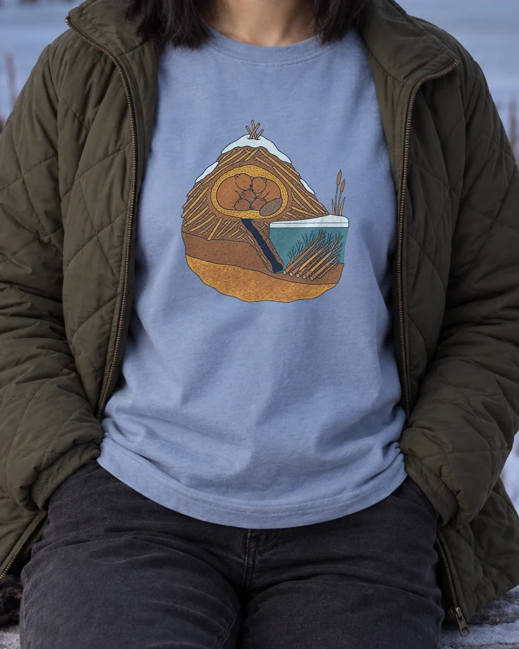 AI-generated image of a fictional model wearing the Beaver in Winter Tee in Washed Denim, size M, at 5′3″ tall, cropped to the print.